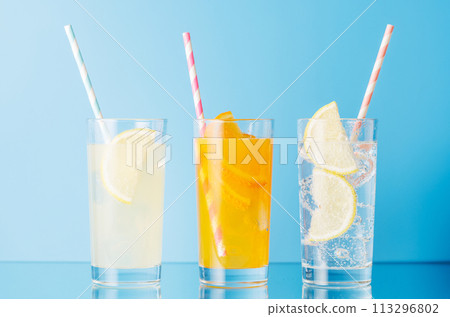 Various lemonade with ice in glasses 113296802