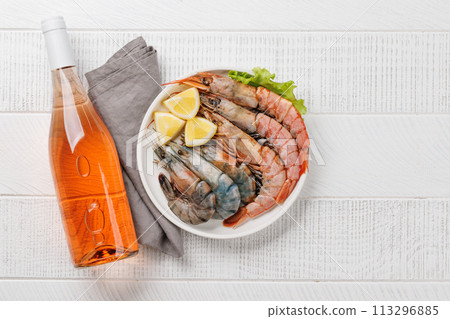 Raw shrimps on plate Raw shrimps on plate 113296885
