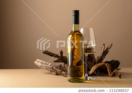 White wine and snags on a beige background. 113298037