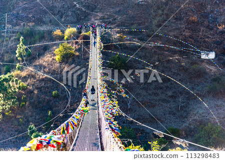 The Punakha Suspension Bridge at the Punakha Dzong in Bhutan. 113298483