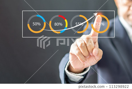Businessman wearing a black suit pointing high graph to tell interest finance banking, economy, stock, market, oil, gas, petroleum, concept, selective focus, close-up Copy space, blur background Businessman wearing a black suit pointing high graph to tell interest finance banking, economy, stock, market, oil, gas, petroleum, concept, selective focus, close-up Copy space, blur background 113298922
