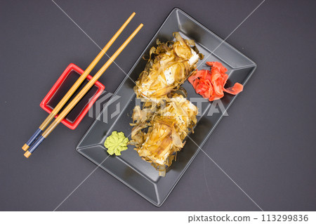 Elegant Sushi Setup with Condiments Elegant Sushi Setup with Condiments 113299836
