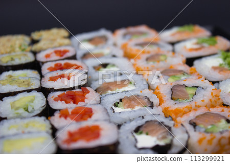 Sushi Feast on a Black Plate Sushi Feast on a Black Plate 113299921