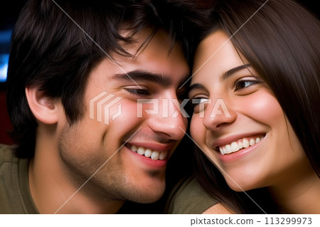 A man and a woman are smiling at the camera 113299973
