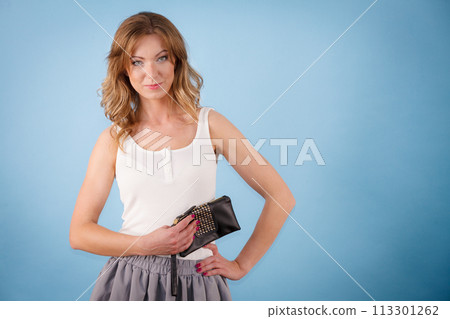 Elegant woman holding hand purse wallet 113301262