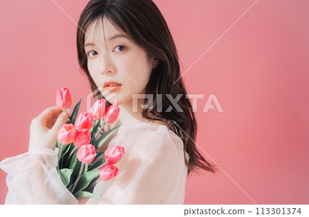 woman with tulip flowers woman with tulip flowers 113301374
