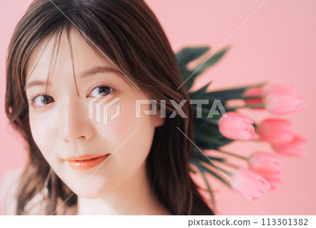 woman with tulip flowers woman with tulip flowers 113301382