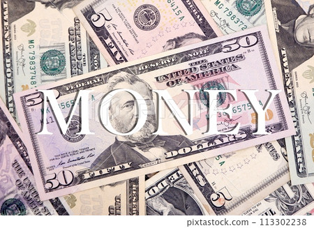 Foreign banknotes and the word MONEY Foreign banknotes and the word MONEY 113302238