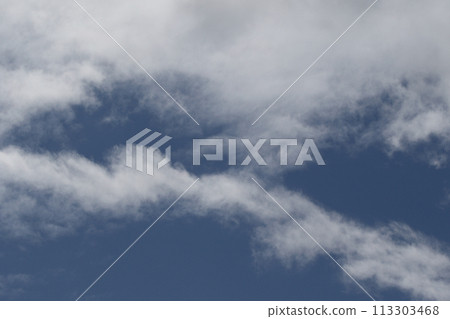 Cloudscape scenery, overcast weather above dark blue sky. Storm clouds floating in a rainy dull day with natural light. White and grey scenic environment background. Nature view. 113303468