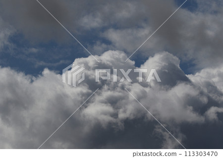Cloudscape scenery, overcast weather above dark blue sky. Storm clouds floating in a rainy dull day with natural light. White and grey scenic environment background. Nature view. Cloudscape scenery, overcast weather above dark blue sky. Storm clouds floating in a rainy dull day with natural light. White and grey scenic environment background. Nature view. 113303470
