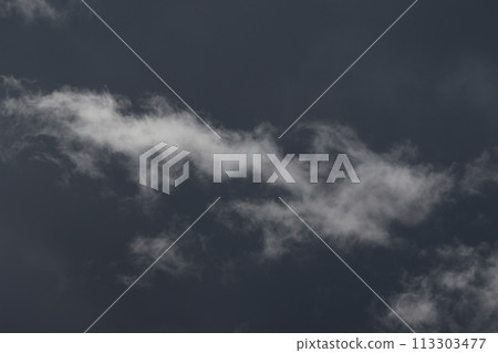 Cloudscape scenery, overcast weather above dark blue sky. Storm clouds floating in a rainy dull day with natural light. White and grey scenic environment background. Nature view. 113303477