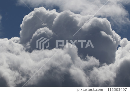 Cloudscape scenery, overcast weather above dark blue sky. Storm clouds floating in a rainy dull day with natural light. White and grey scenic environment background. Nature view. Cloudscape scenery, overcast weather above dark blue sky. Storm clouds floating in a rainy dull day with natural light. White and grey scenic environment background. Nature view. 113303497