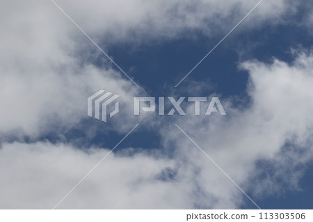 Cloudscape scenery, overcast weather above dark blue sky. Storm clouds floating in a rainy dull day with natural light. White and grey scenic environment background. Nature view. Cloudscape scenery, overcast weather above dark blue sky. Storm clouds floating in a rainy dull day with natural light. White and grey scenic environment background. Nature view. 113303506