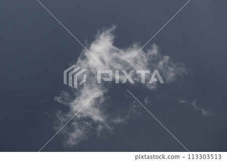 Cloudscape scenery, overcast weather above dark blue sky. Storm clouds floating in a rainy dull day with natural light. White and grey scenic environment background. Nature view. Cloudscape scenery, overcast weather above dark blue sky. Storm clouds floating in a rainy dull day with natural light. White and grey scenic environment background. Nature view. 113303513