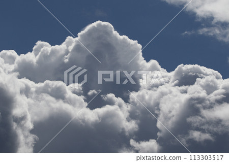 Cloudscape scenery, overcast weather above dark blue sky. Storm clouds floating in a rainy dull day with natural light. White and grey scenic environment background. Nature view. Cloudscape scenery, overcast weather above dark blue sky. Storm clouds floating in a rainy dull day with natural light. White and grey scenic environment background. Nature view. 113303517