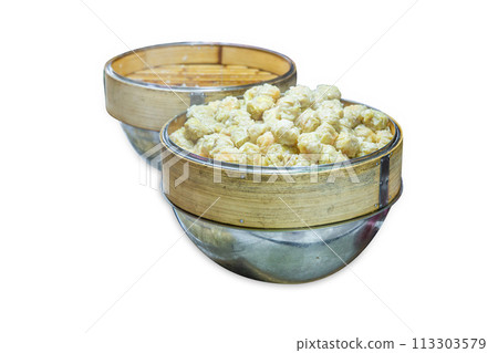 Top view of Basket of dumplings, moldy, focus selective 113303579