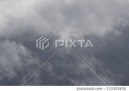 Cloudscape scenery, overcast weather above dark blue sky. Storm clouds floating in a rainy dull day with natural light. White and grey scenic environment background. Nature view. 113303656