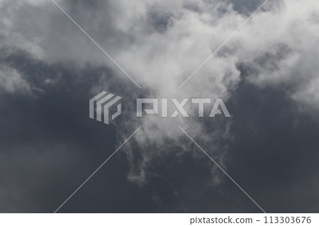 Cloudscape scenery, overcast weather above dark blue sky. Storm clouds floating in a rainy dull day with natural light. White and grey scenic environment background. Nature view. 113303676