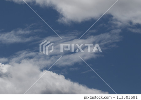 Cloudscape scenery, overcast weather above dark blue sky. Storm clouds floating in a rainy dull day with natural light. White and grey scenic environment background. Nature view. Cloudscape scenery, overcast weather above dark blue sky. Storm clouds floating in a rainy dull day with natural light. White and grey scenic environment background. Nature view. 113303691