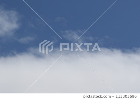 Cloudscape scenery, overcast weather above dark blue sky. Storm clouds floating in a rainy dull day with natural light. White and grey scenic environment background. Nature view. 113303696