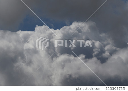Cloudscape scenery, overcast weather above dark blue sky. Storm clouds floating in a rainy dull day with natural light. White and grey scenic environment background. Nature view. 113303735