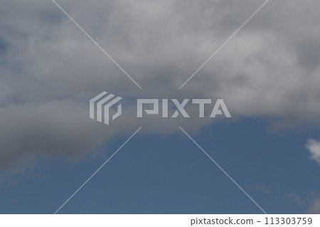 Cloudscape scenery, overcast weather above dark blue sky. Storm clouds floating in a rainy dull day with natural light. White and grey scenic environment background. Nature view. Cloudscape scenery, overcast weather above dark blue sky. Storm clouds floating in a rainy dull day with natural light. White and grey scenic environment background. Nature view. 113303759