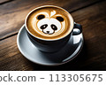 Cup of coffee with latte art, milk foam panda bear illustration. Cup of handcrafted cappuccino on wooden table for coffee lovers. Cozy atmosphere. 113305675
