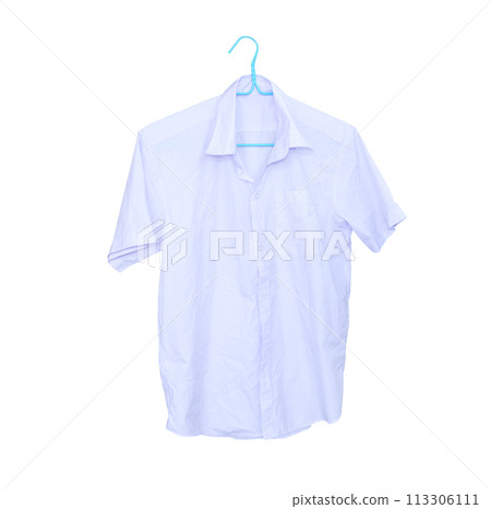 White short sleeved shirt hanging against wooden wall 113306111