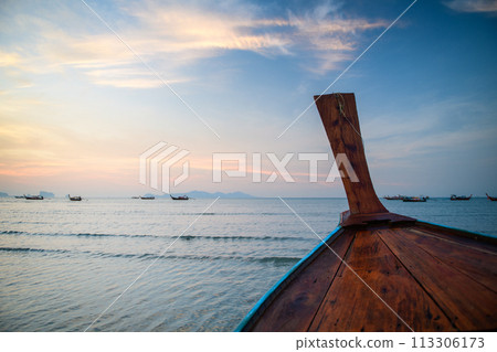 Around the bow of a long-tailed boat while sailing in the sea. On the way to travel to Koh Kradan, Around the bow of a long-tailed boat while sailing in the sea. On the way to travel to Koh Kradan, 113306173