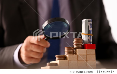 Hand businessman in suit hold quarter 113306617