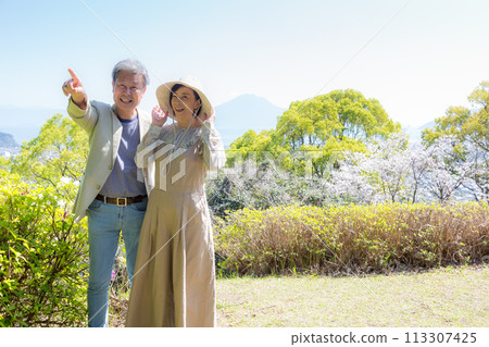 Senior couple visiting shrines Kagoshima trip Sakurajima 113307425