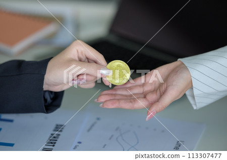 bit coin concept.future digital currency.Businesswoman uses bitcoin currency in exchange.Money system in the electronic world 113307477