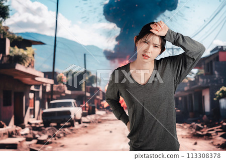 Young woman running away from explosion 113308378