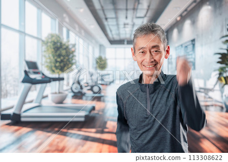 Senior man exercising at the gym Senior man exercising at the gym 113308622