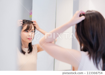 Young woman getting ready in the morning Young woman getting ready in the morning 113308754