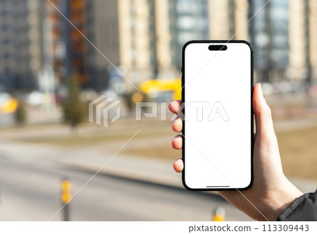 Berlin Germany January 21 2024 Hand holding mobile phone, iphone screen mockup, blank smartphone Berlin Germany January 21 2024 Hand holding mobile phone, iphone screen mockup, blank smartphone 113309443