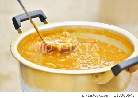 Curry made in a large pot, cooking outdoors, camping curry, image material 113309643