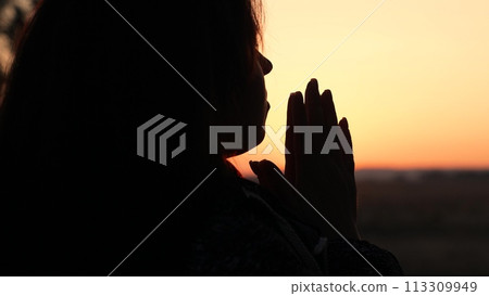 girl woman praying at sunset, hand sunset faith pain, asking heaven for help, girl sunset contemplation, silent prayer silhouette, sunset spiritual practice, evening devotion calm, girl meditating girl woman praying at sunset, hand sunset faith pain, asking heaven for help, girl sunset contemplation, silent prayer silhouette, sunset spiritual practice, evening devotion calm, girl meditating 113309949