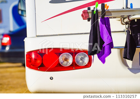 Caravan with clothes to dry on back rack Caravan with clothes to dry on back rack 113310257