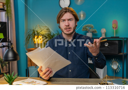 Conflict quarrel negotiation angry mad business man engaged in webcam online video at home office Conflict quarrel negotiation angry mad business man engaged in webcam online video at home office 113310716