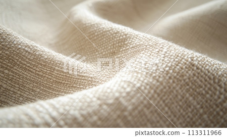 Close-up of a textured woven natural fabric that highlights intricate patterns and quality. Close-up of a textured woven natural fabric that highlights intricate patterns and quality. 113311966