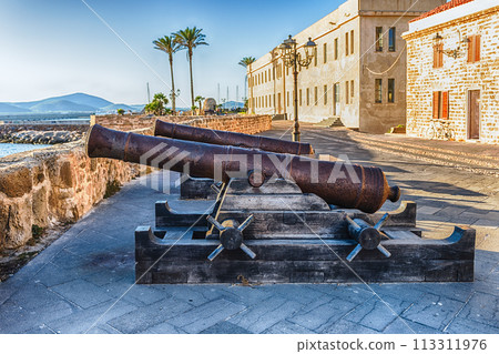 Disused cannons on the historic ramparts in Alghero, Sardinia, Italy Disused cannons on the historic ramparts in Alghero, Sardinia, Italy 113311976