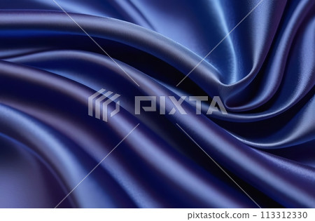 Silky blue textile draped elegantly with soft shadows and highlights 113312330