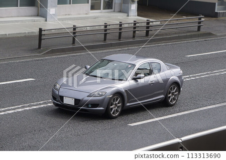 Sports car road driving 113313690