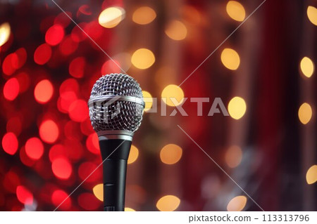 Microphone on stage background, close-up with bokeh effect 113313796