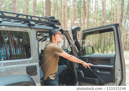 A male camper who loves the outdoors and travels, drives and camps in RVs, SUVs and cars A male camper who loves the outdoors and travels, drives and camps in RVs, SUVs and cars 113315246