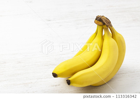 Banana on a white board 113316342