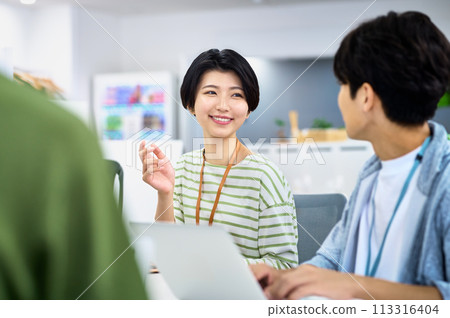 Young female engineer working in the office 113316404
