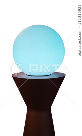 Isolated image of glowing glass beads on wooden base on white background. 113316922