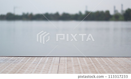 simple panoramic background wallpaper pattern of wooden deck floor lake waterfront, background with copy space 113317233